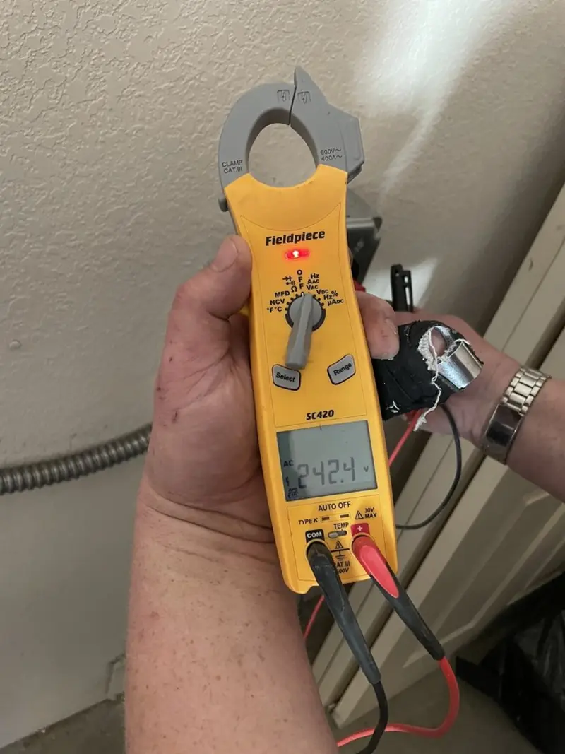 Voltage testing with clamp meter during Aluminum Wiring Replacement in Wheaton